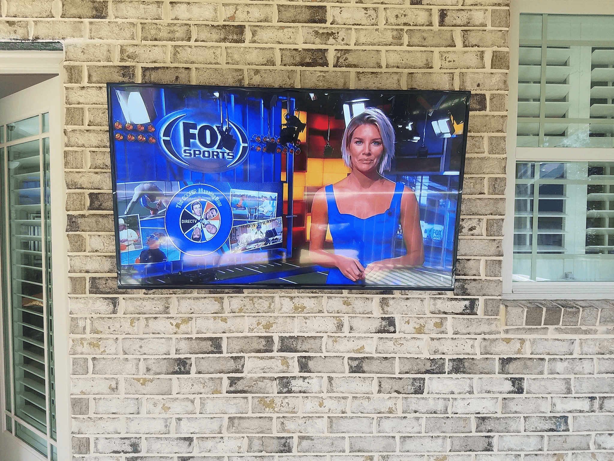 Outdoor TV on Brick Patio